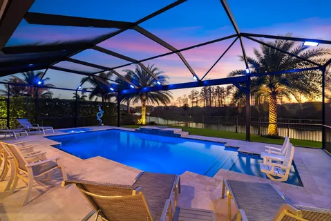 a view of swimming pool with outdoor seating