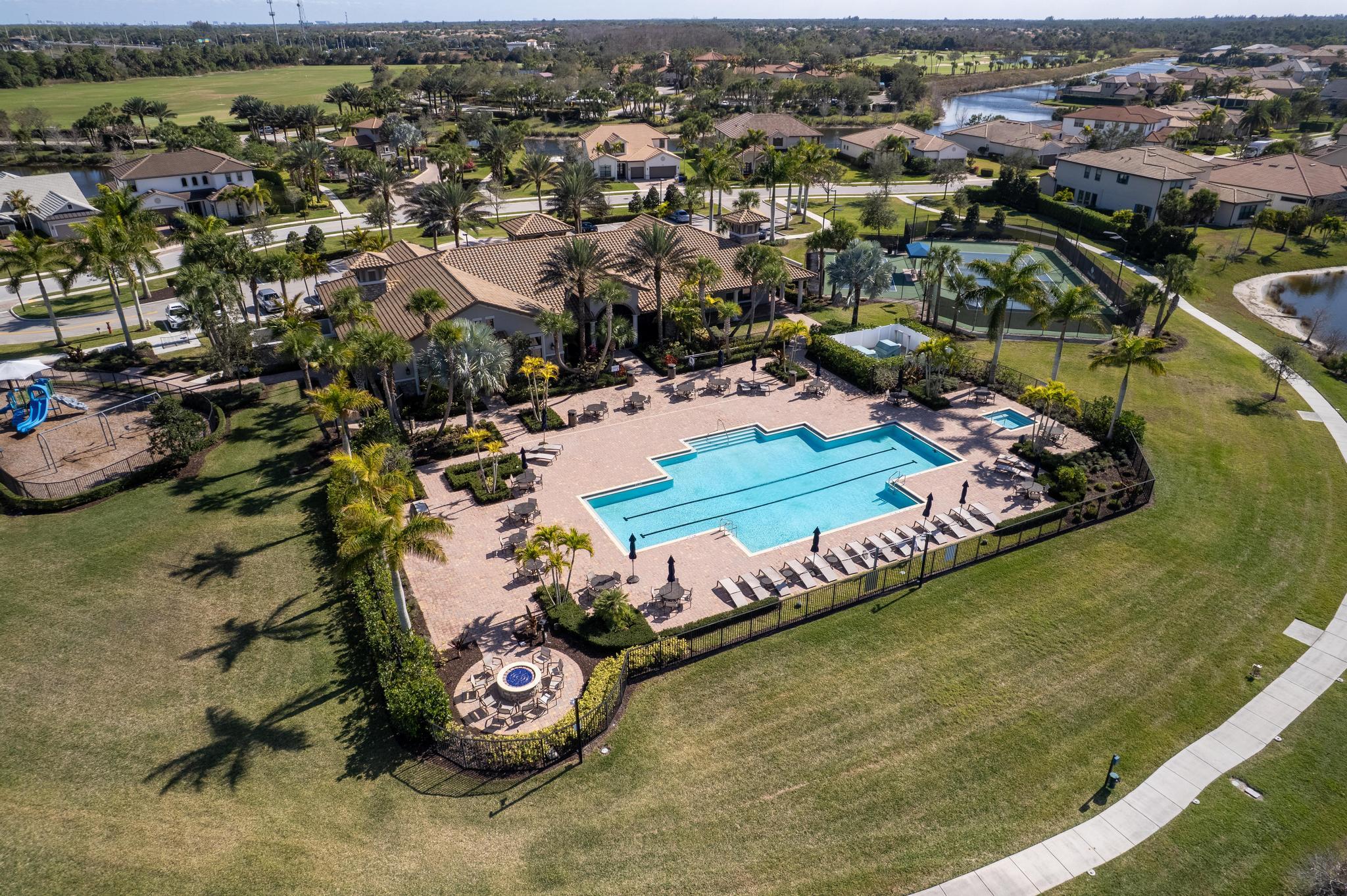 137 Cinder Dunes Point Jupiter, FL 33478 - Photo 43 of 45 an aerial view of residential houses with outdoor space