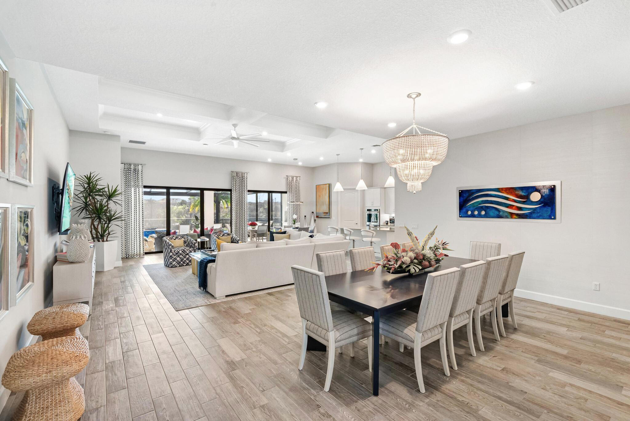 137 Cinder Dunes Point Jupiter, FL 33478 - Photo 8 of 45 a view of a dining room with furniture and wooden floor