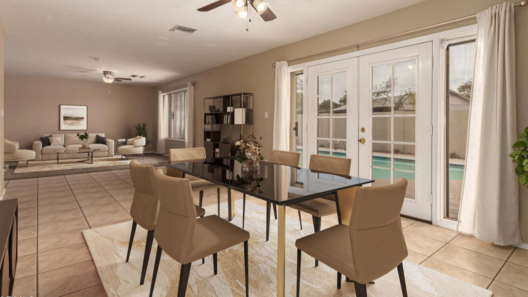 3613 South Kenneth Place Tempe, AZ 85282 - Photo 1 of 17 a view of a dining room with furniture window and outside view