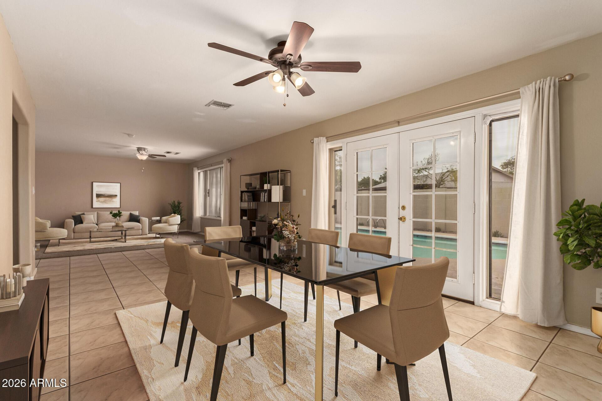 3613 South Kenneth Place Tempe, AZ 85282 - Photo 5 of 17 a view of a dining room with furniture window and outside view