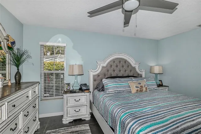 a kitchen with refrigerator and mirror