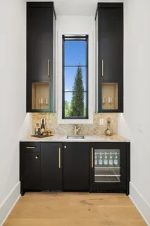 a kitchen with stainless steel appliances granite countertop a stove and a sink