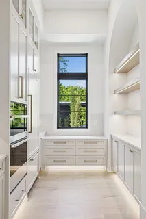 a bathroom with a bathtub and shower