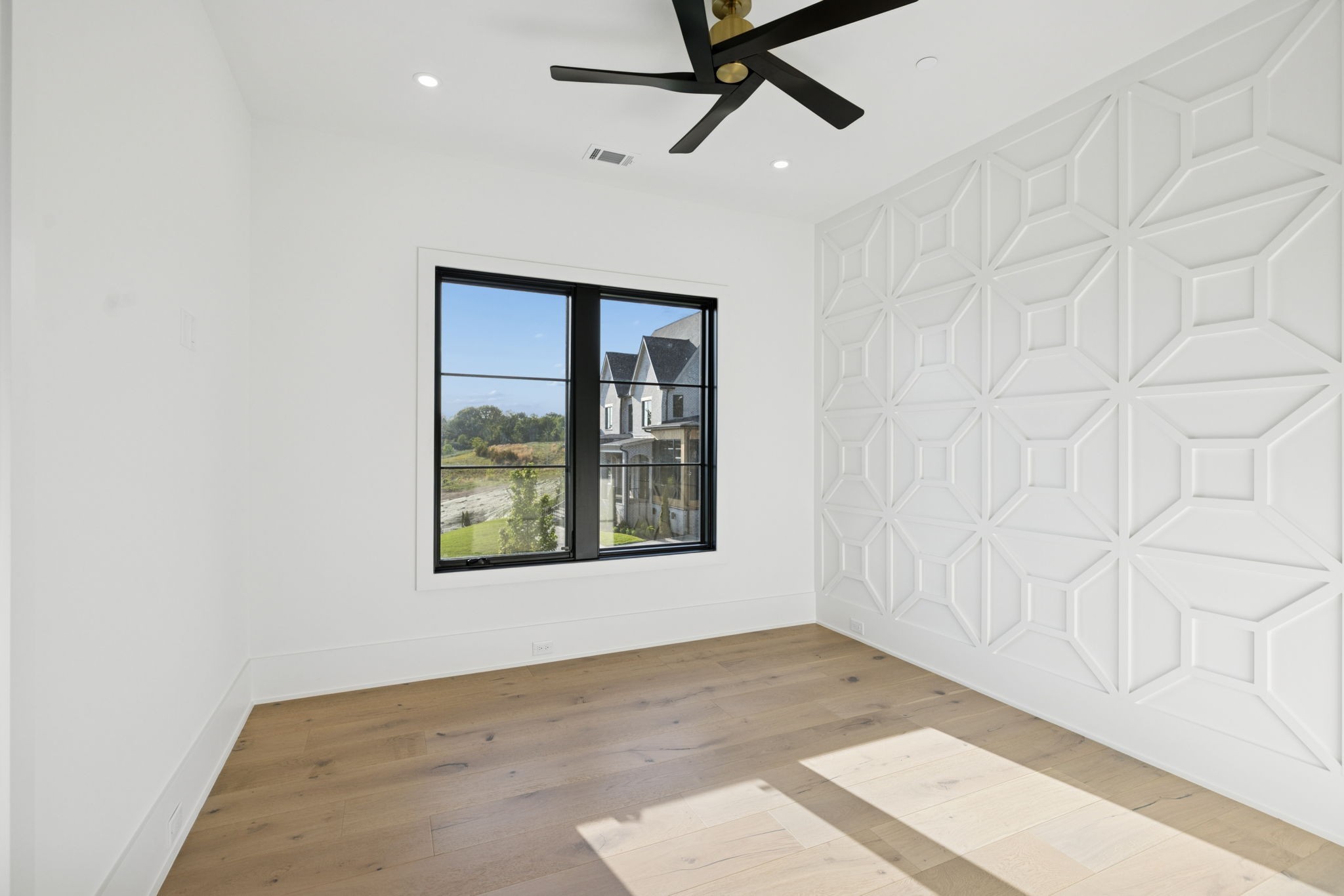 9636 Concord Road Brentwood, TN 37027 - Photo 67 of 99 an empty room with a window and a ceiling fan