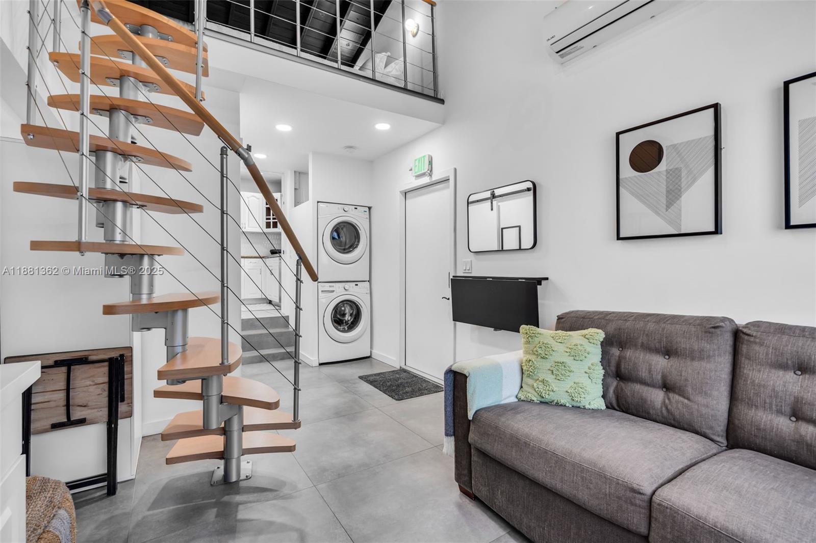 1642 Southwest 16th Street Miami, FL 33145 - Photo 18 of 28 a living room with furniture and a painting