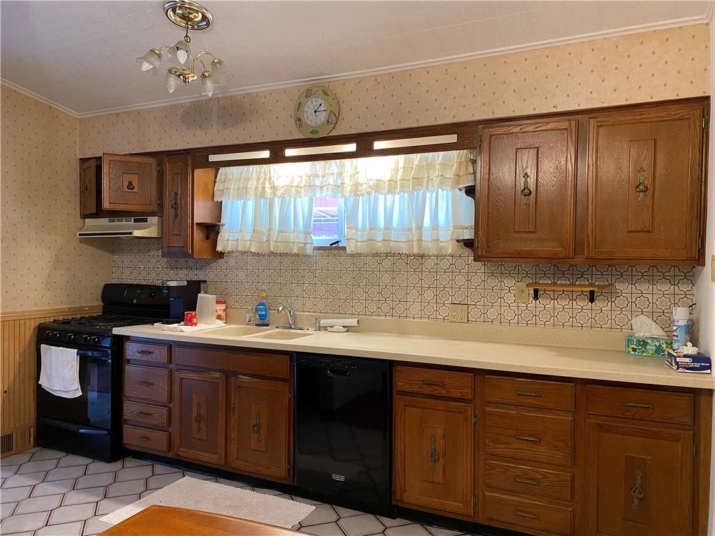 2647 Paige Street Lower Burrell, PA 15068 - Photo 2 of 13 a kitchen with a sink and cabinets