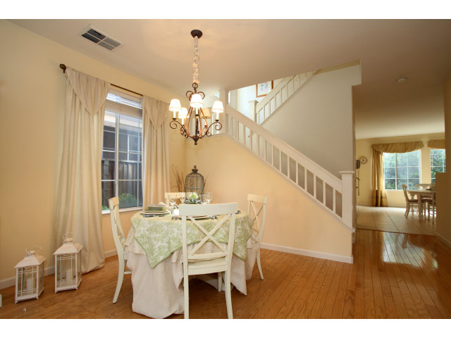 909 Sunbonnet Loop San Jose, CA 95125 - Photo 3 of 22 a view of a dining room with furniture and a chandelier