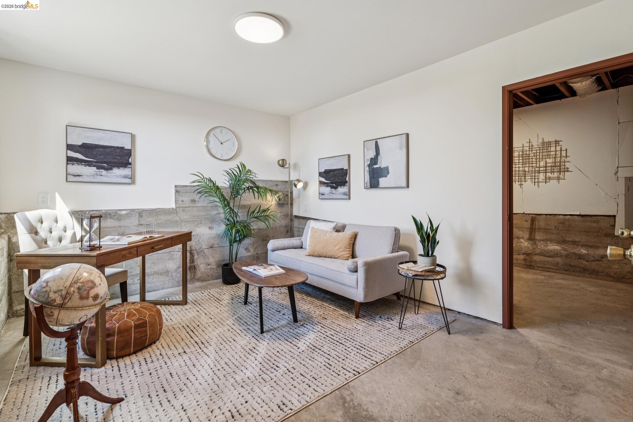 20 Stevenson Avenue Berkeley, CA 94708 - Photo 34 of 53 a living room with furniture and wooden floor