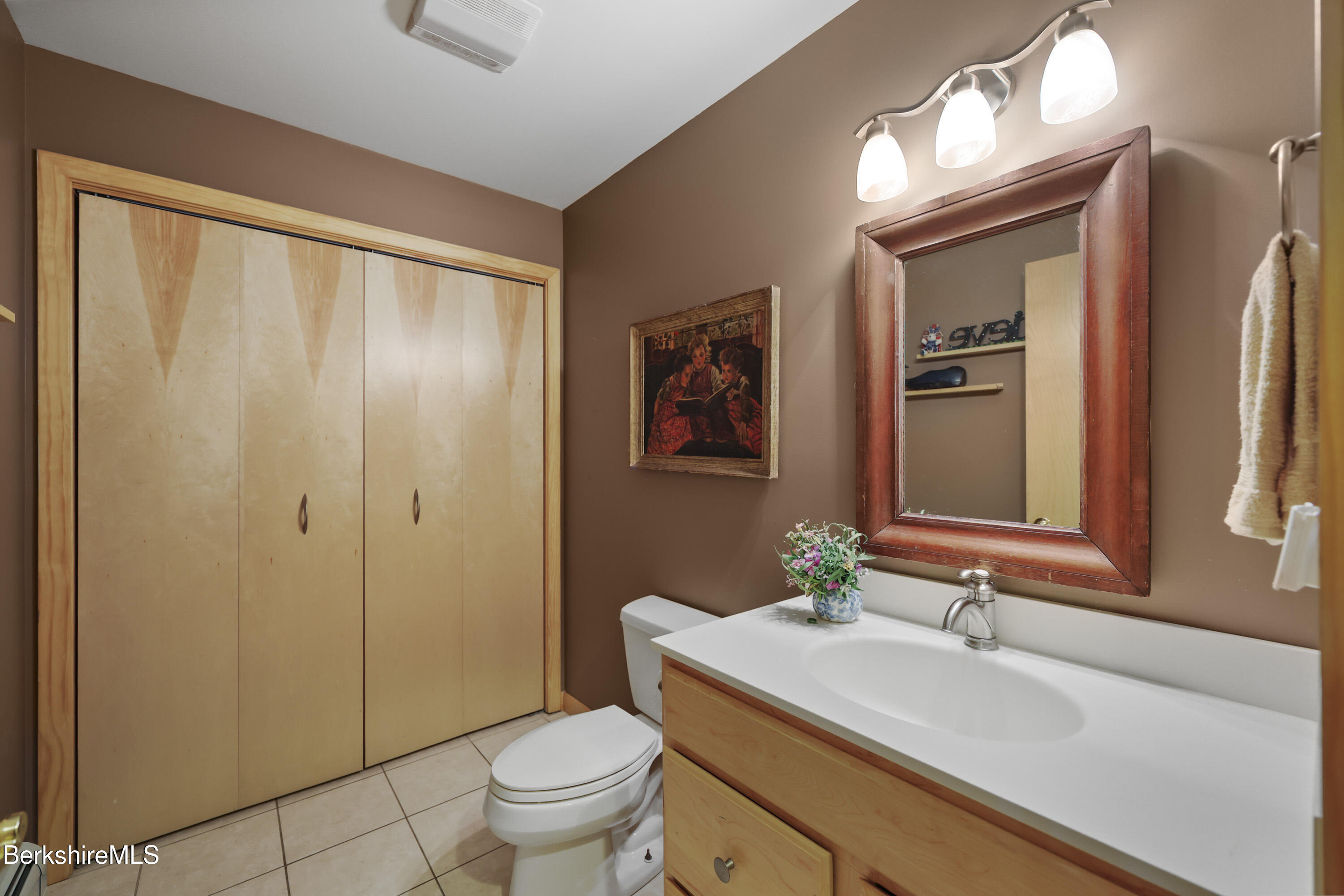 83 Hancock Road Pittsfield, MA 01201 - Photo 19 of 51 a bathroom with a sink toilet and shower