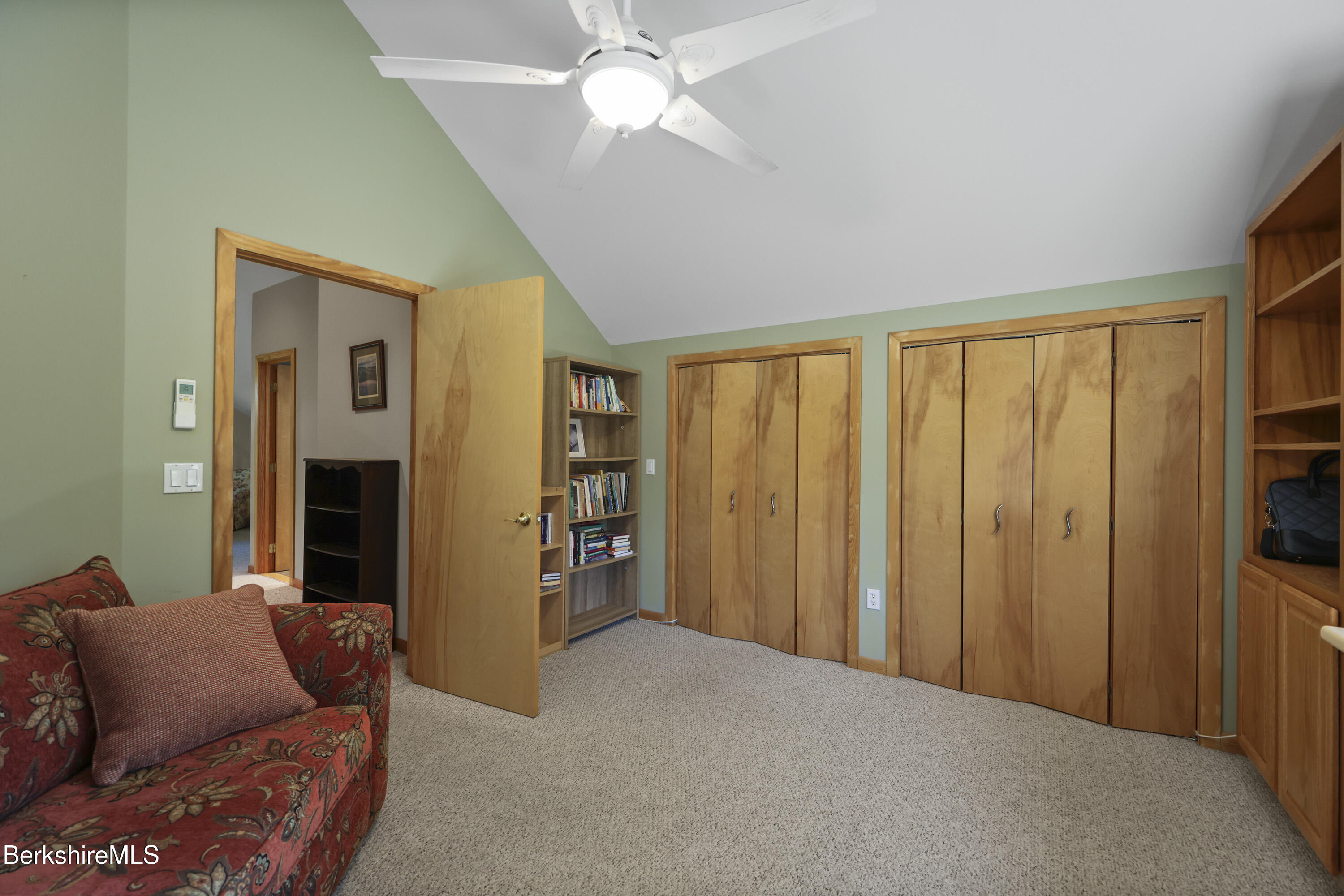 83 Hancock Road Pittsfield, MA 01201 - Photo 29 of 51 a bedroom with furniture and a ceiling fan