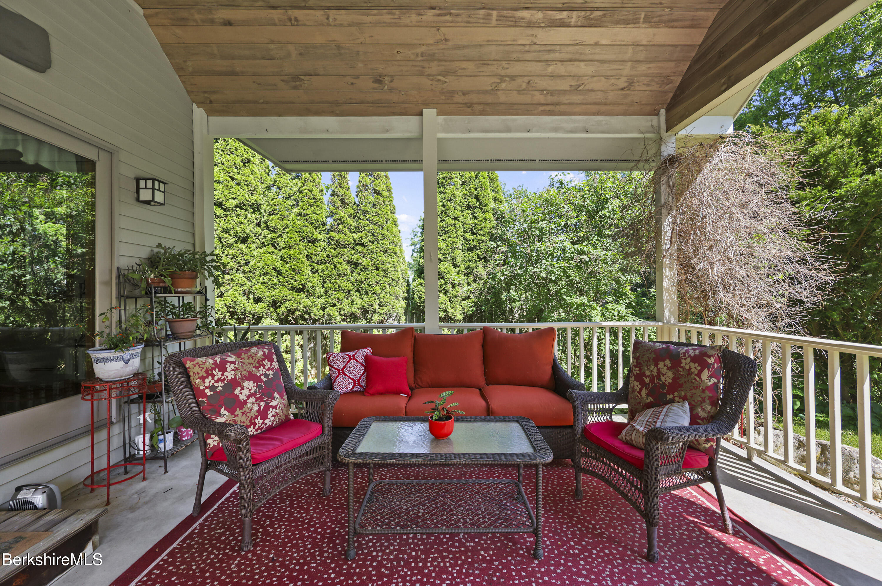 83 Hancock Road Pittsfield, MA 01201 - Photo 31 of 51 a outdoor living space with furniture and a potted plant