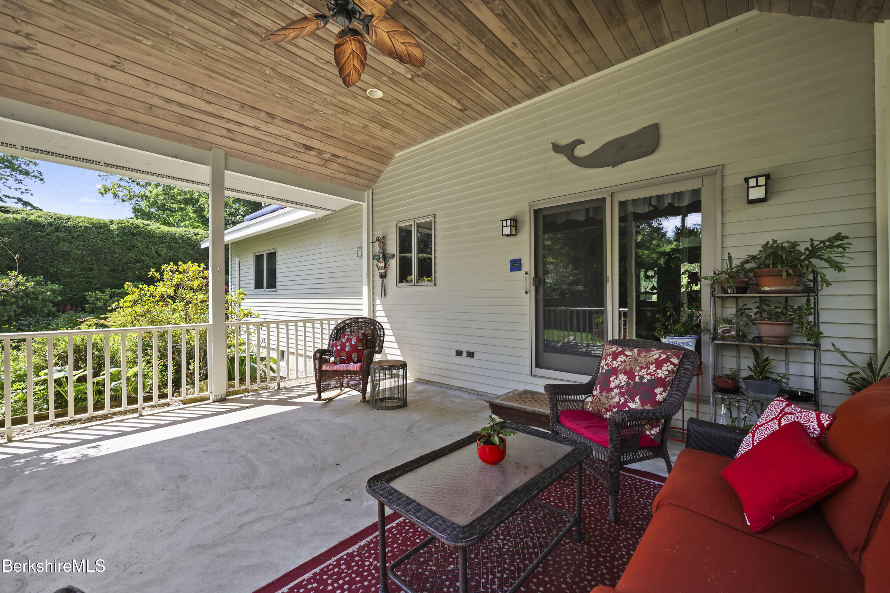 83 Hancock Road Pittsfield, MA 01201 - Photo 33 of 51 a backyard of a house with seating space