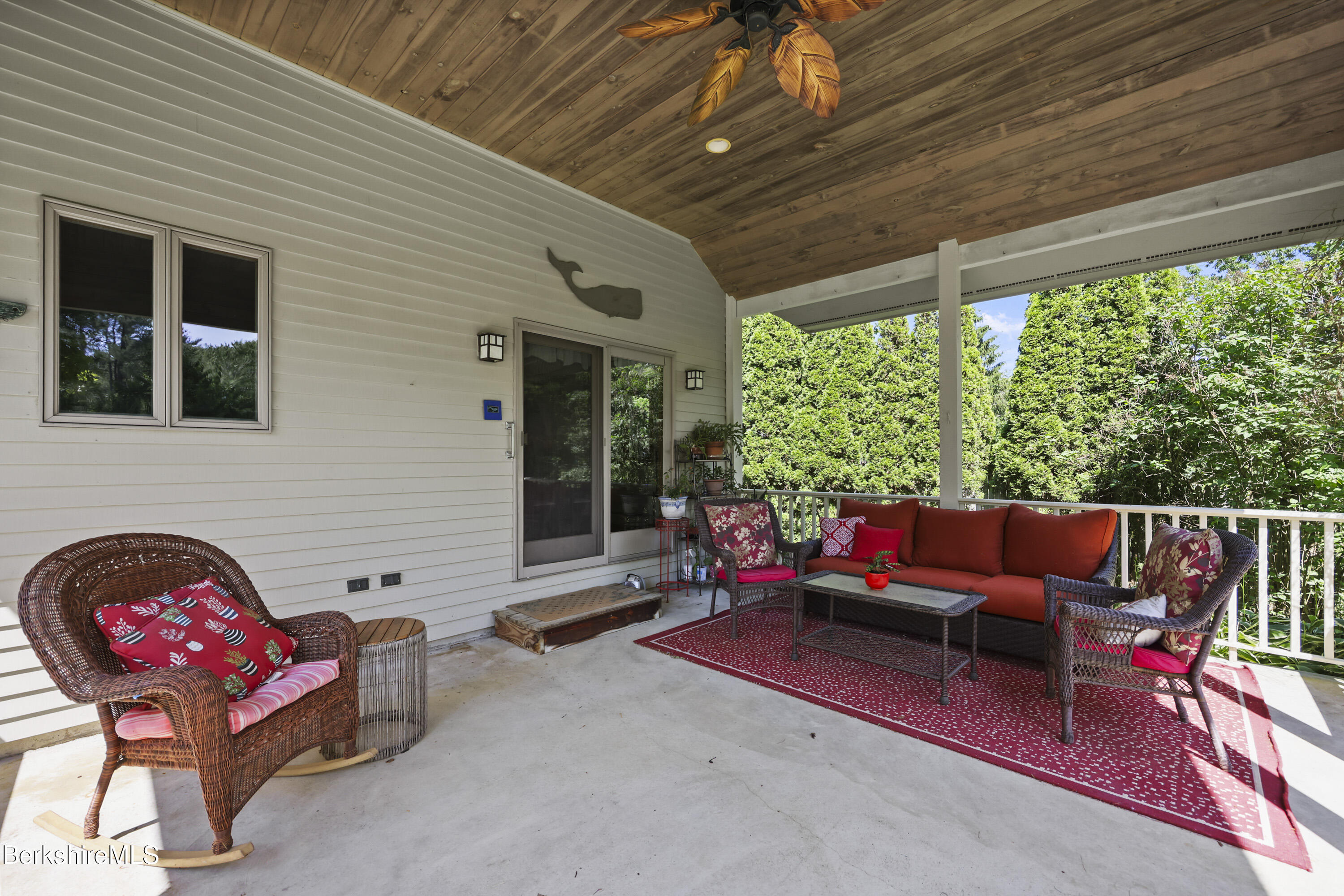 83 Hancock Road Pittsfield, MA 01201 - Photo 34 of 51 a outdoor space with patio the couches and a dining table with the garden view