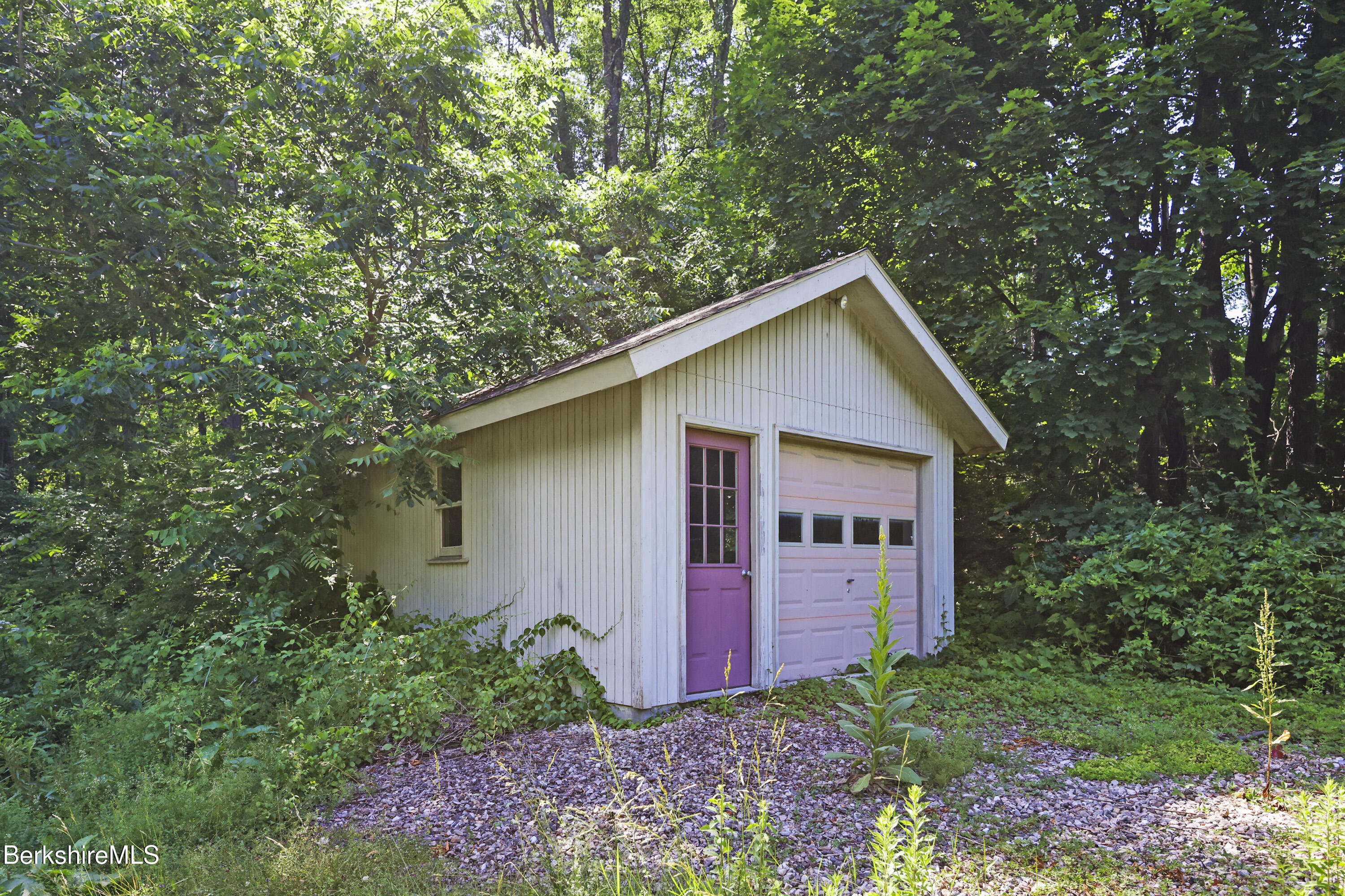 83 Hancock Road Pittsfield, MA 01201 - Photo 45 of 51 a front view of house with yard and trees