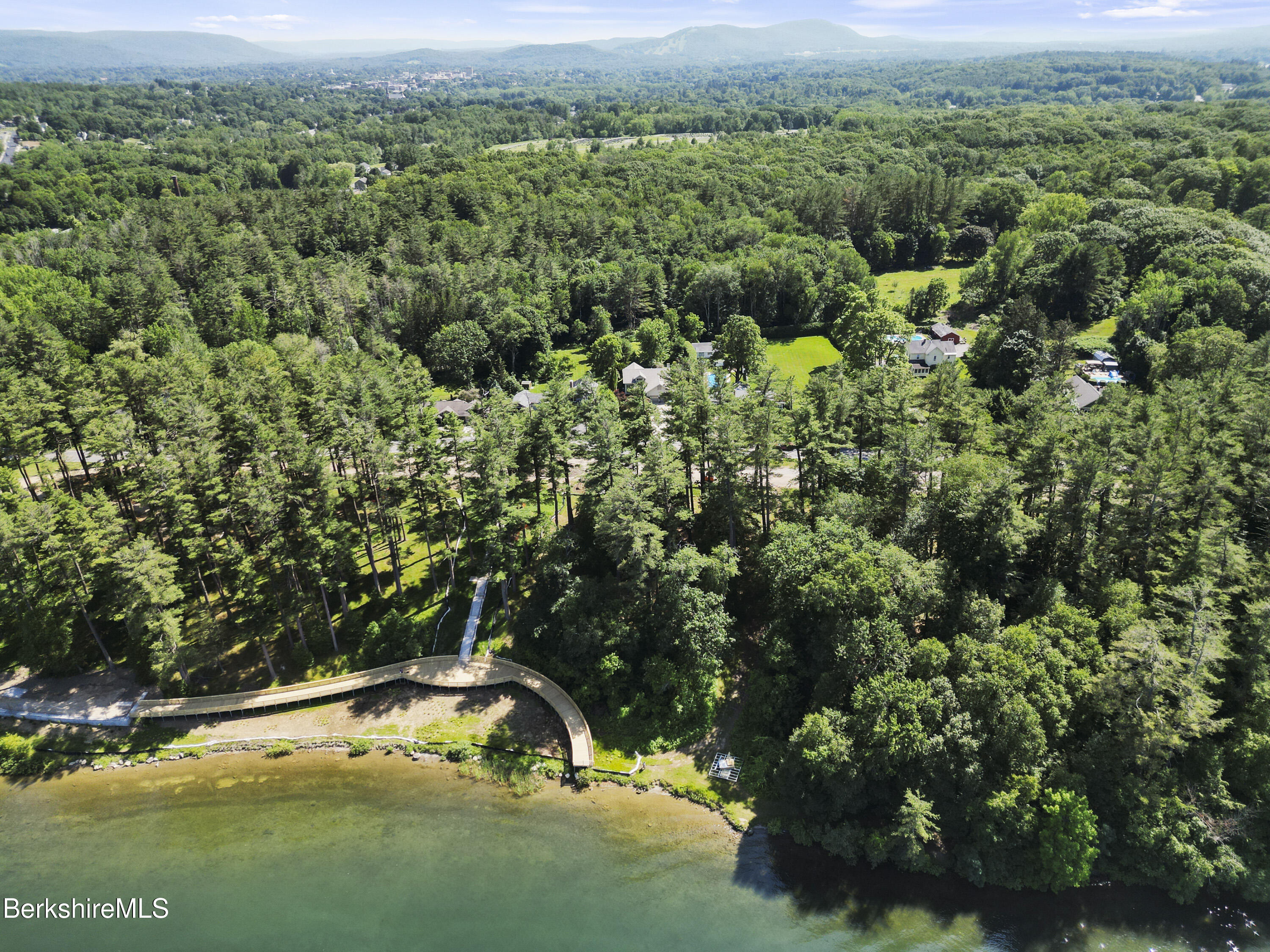 83 Hancock Road Pittsfield, MA 01201 - Photo 5 of 51 a view of a forest with a park