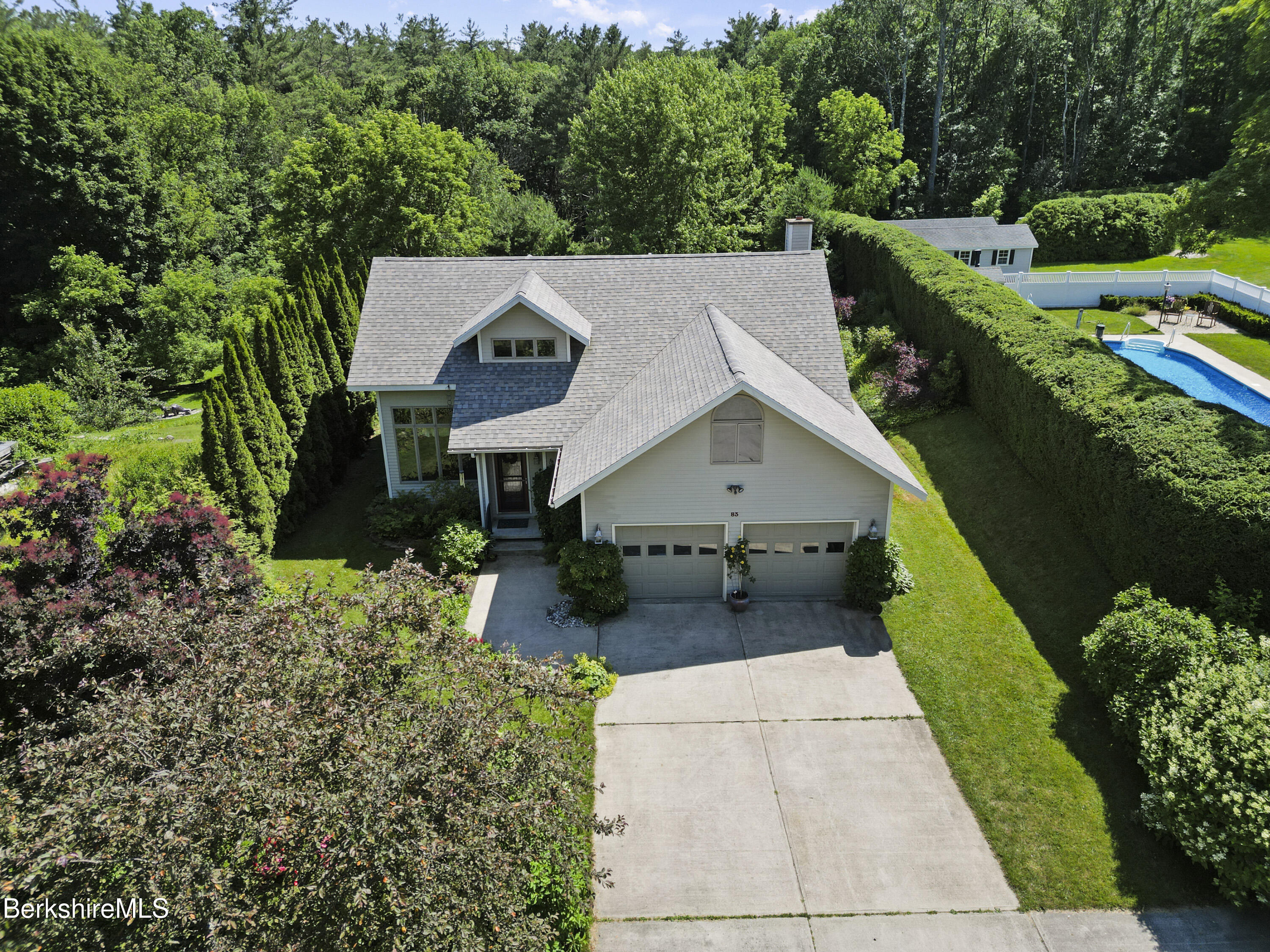 83 Hancock Road Pittsfield, MA 01201 - Photo 51 of 51 a aerial view of a house with a yard