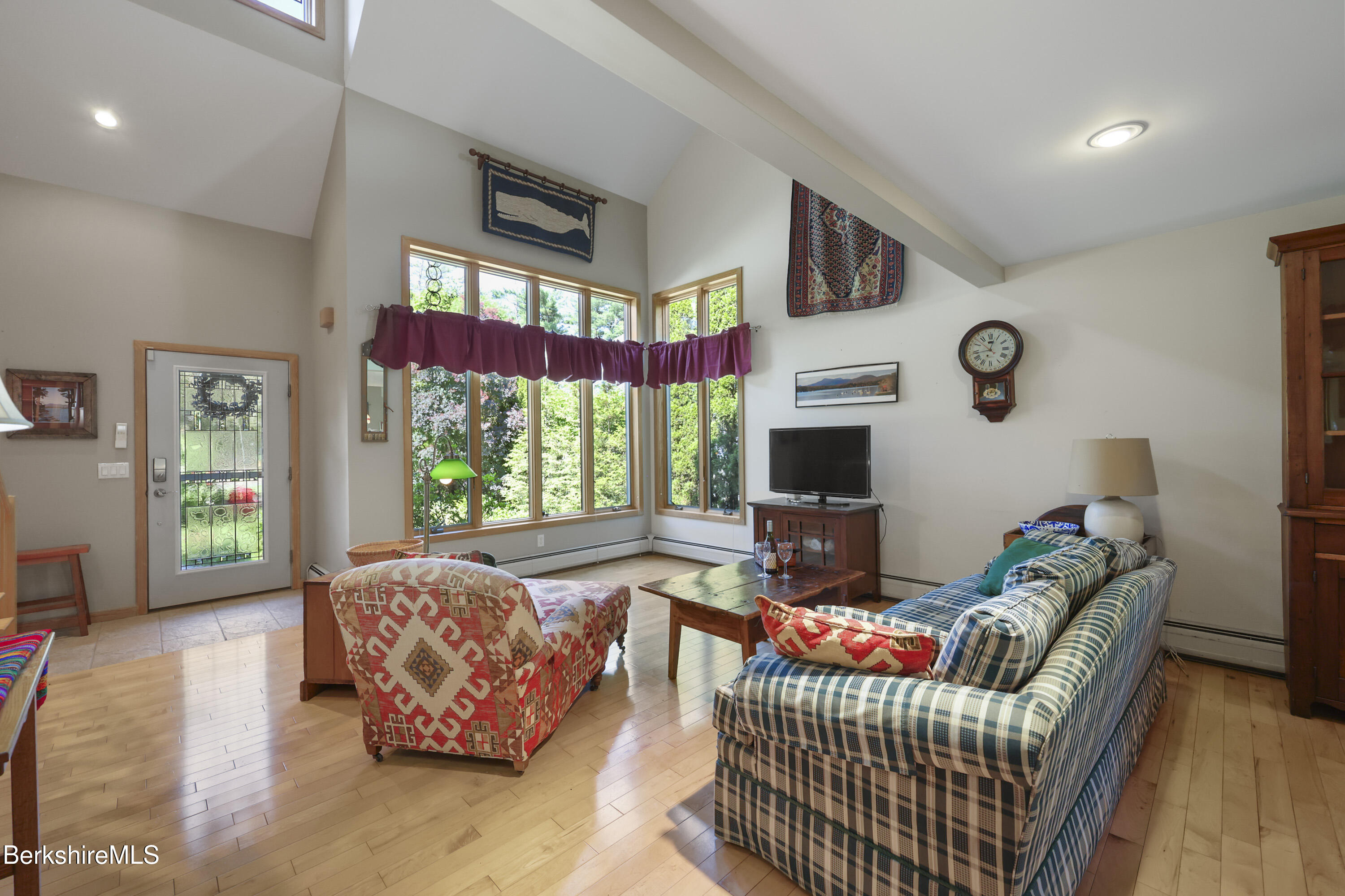 83 Hancock Road Pittsfield, MA 01201 - Photo 8 of 51 a living room with furniture fireplace and flat screen tv