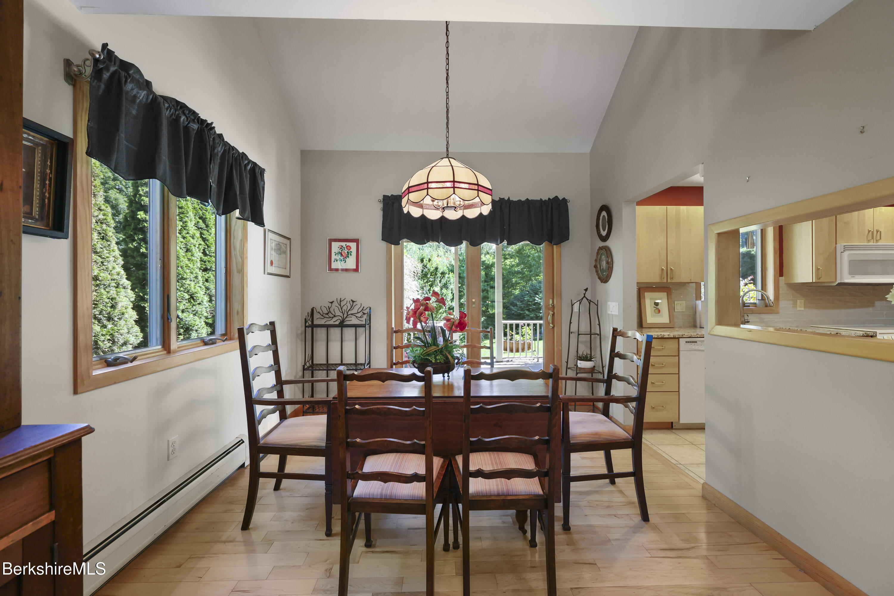 83 Hancock Road Pittsfield, MA 01201 - Photo 10 of 51 a dining room with furniture a chandelier and window
