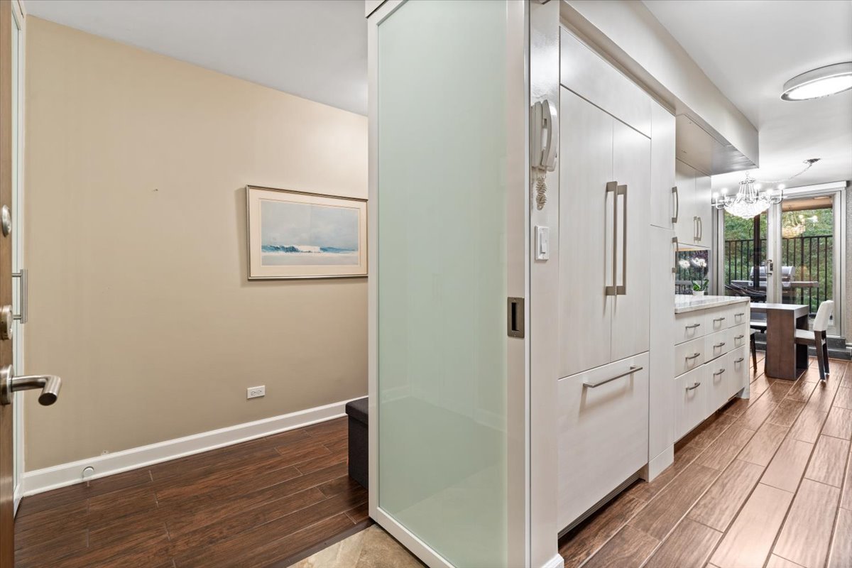 1310 North Ritchie Court, Unit 3A Chicago, IL 60610 - Photo 2 of 23 a view of a hallway with closet area