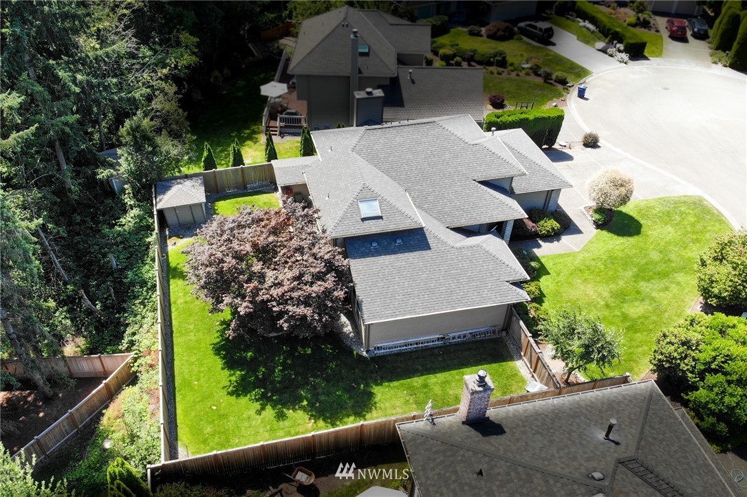 3126 210th Street Southeast Bothell, WA 98021 - Photo 28 of 33 an aerial view of a house with a garden and plants