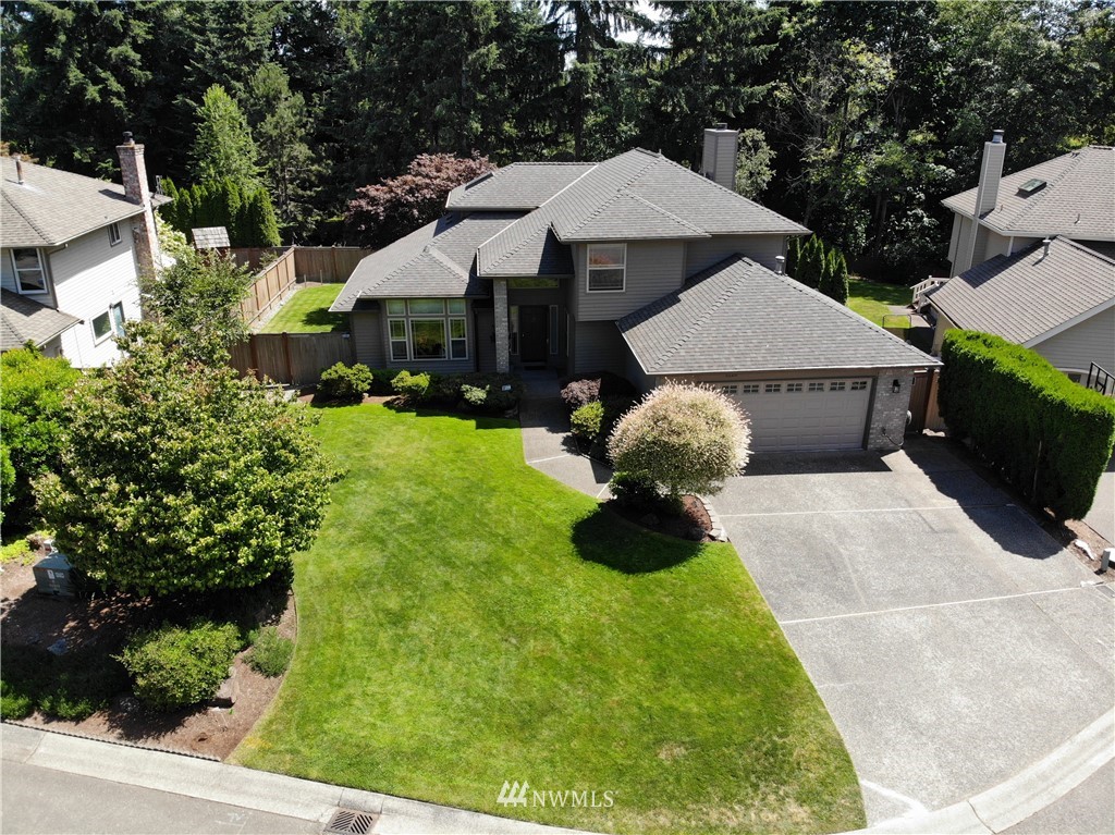 3126 210th Street Southeast Bothell, WA 98021 - Photo 30 of 33 a aerial view of a house with yard and furniture