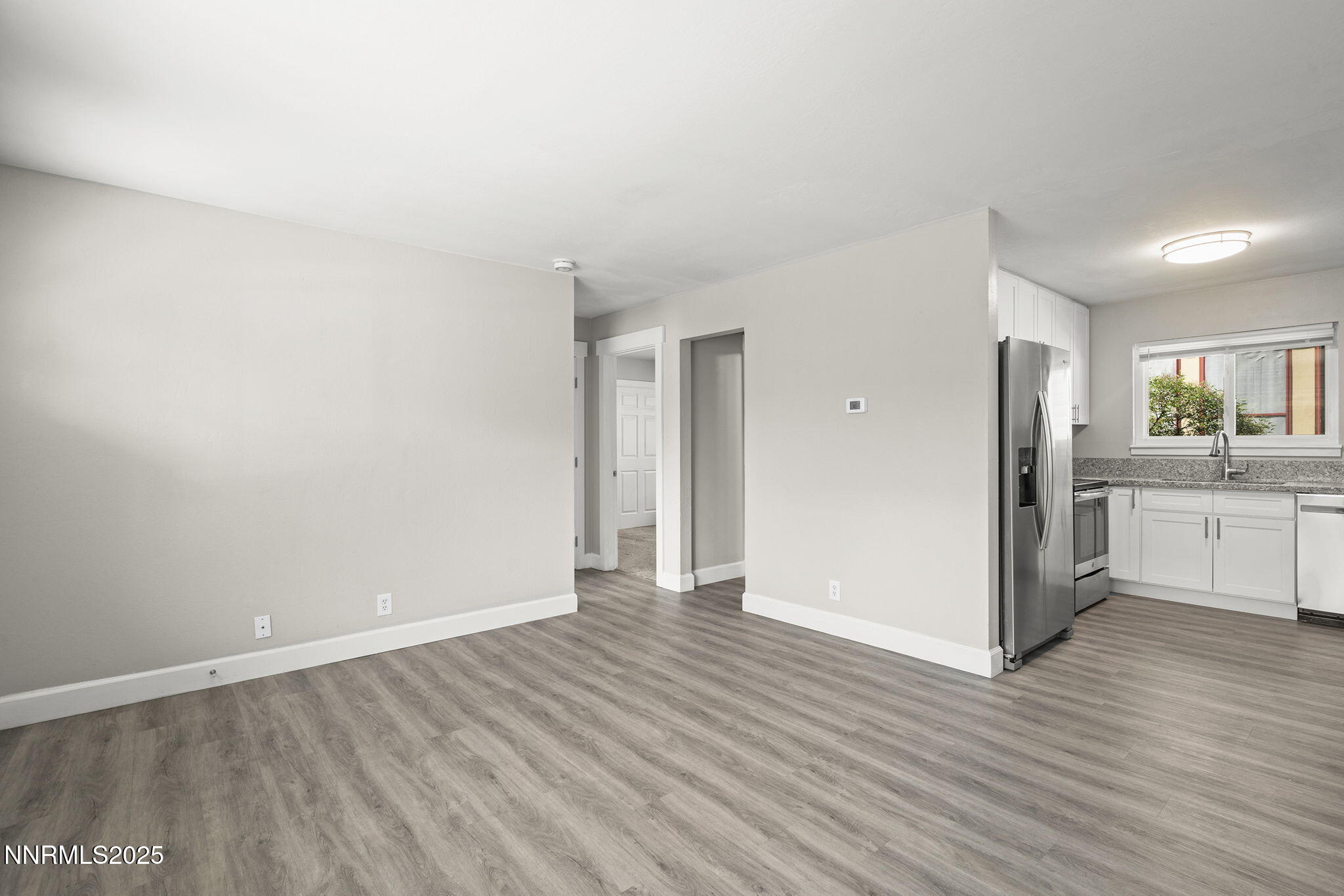 1227 Gordon Avenue Reno, NV 89509 - Photo 8 of 22 a view of a kitchen with wooden floor