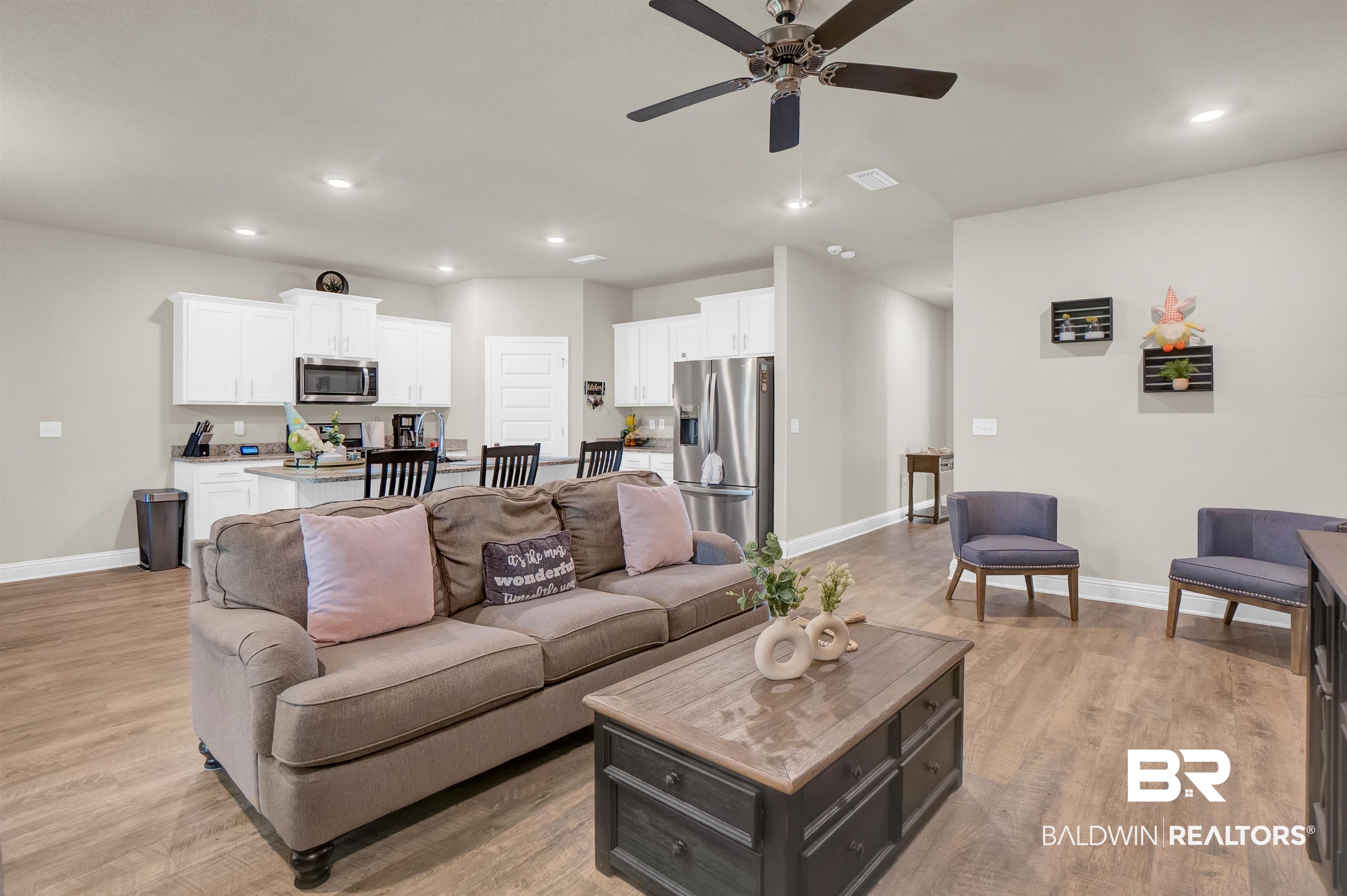 31671 Memphis Loop Daphne, AL 36527 - Photo 20 of 51 Living area featuring baseboards, recessed lighting, light wood-style floors, and a ceiling fan