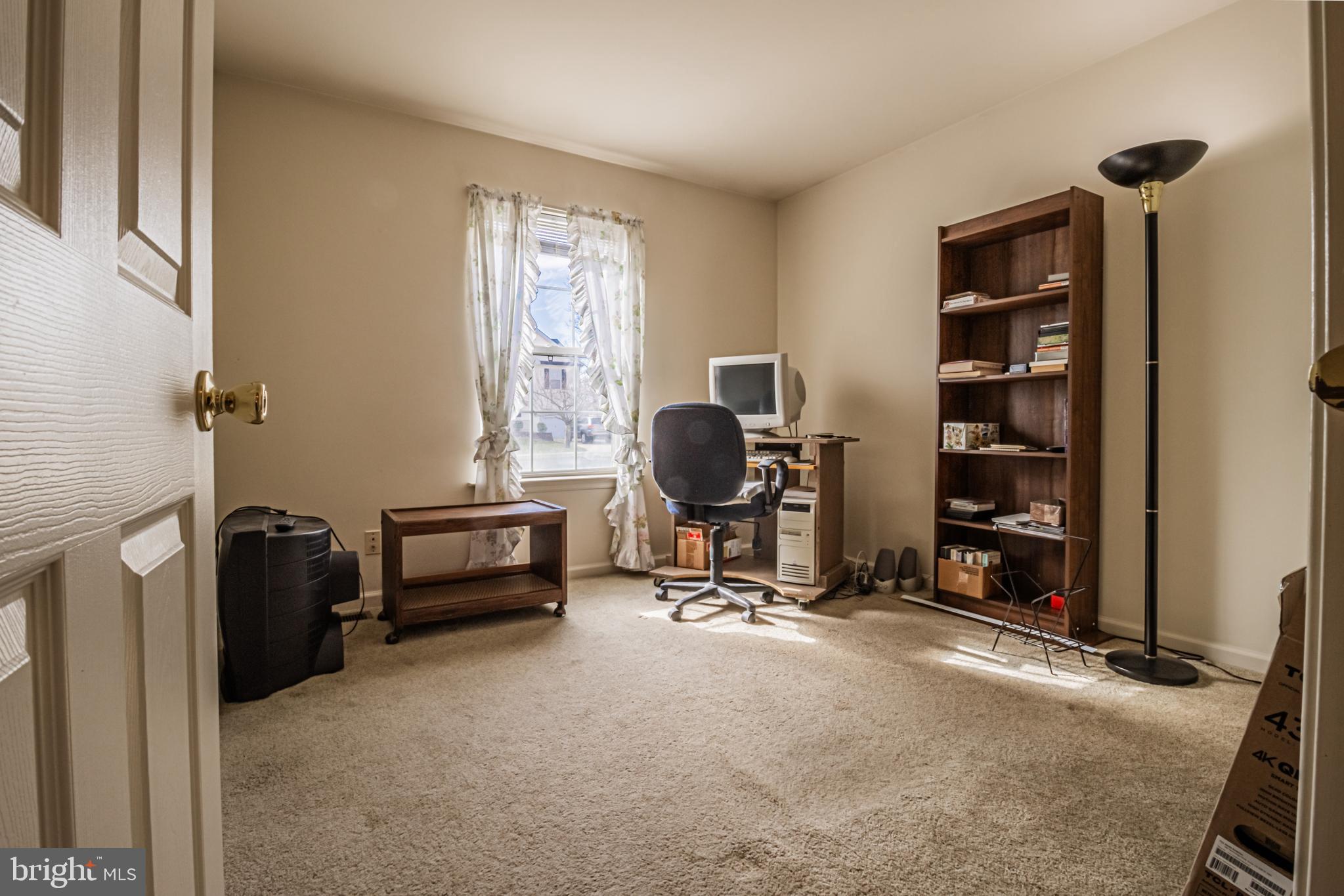 333 Copperfield Drive Williamstown, NJ 08094 - Photo 12 of 17 a view of a workspace with furniture and a window