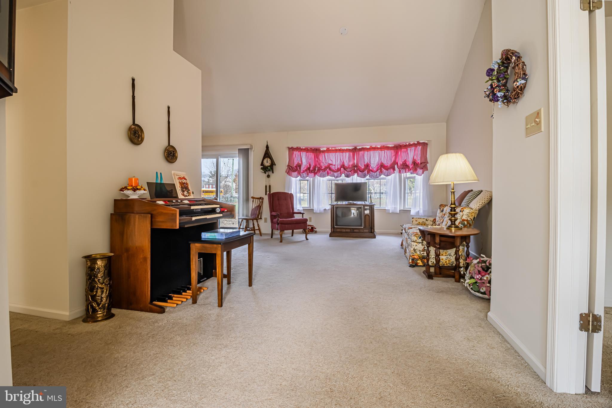 333 Copperfield Drive Williamstown, NJ 08094 - Photo 4 of 17 a living room with furniture and a flat screen tv