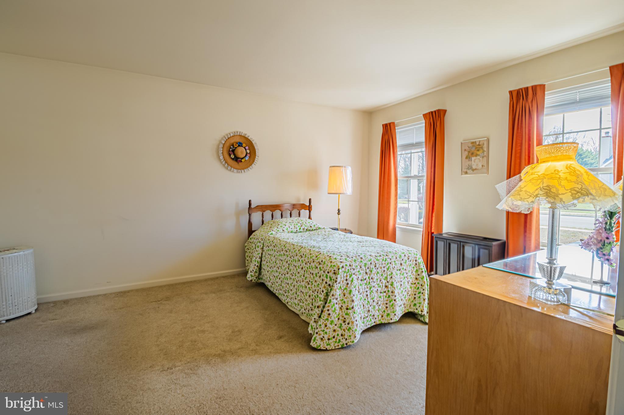 333 Copperfield Drive Williamstown, NJ 08094 - Photo 5 of 17 a bedroom with a bed and a table