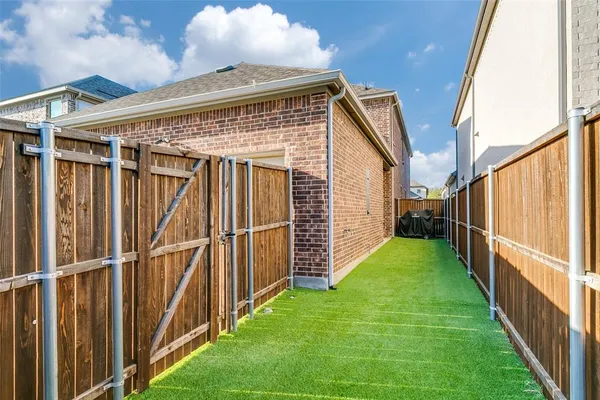 a view of backyard with green space