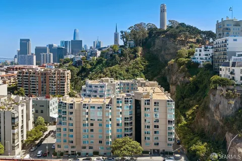 a view of a city with tall buildings
