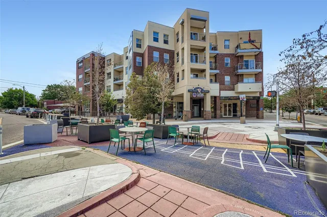 a view of a street with a building