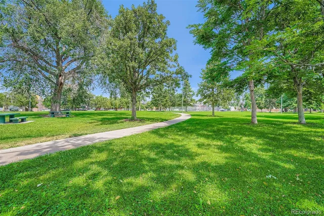 a view of a street with a building