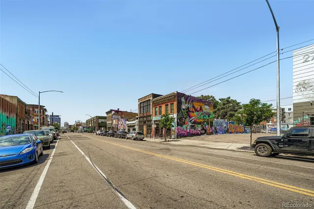 a view of a chairs and table in the patio