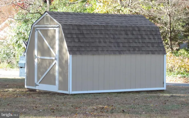 a view of outdoor space and front view of a house
