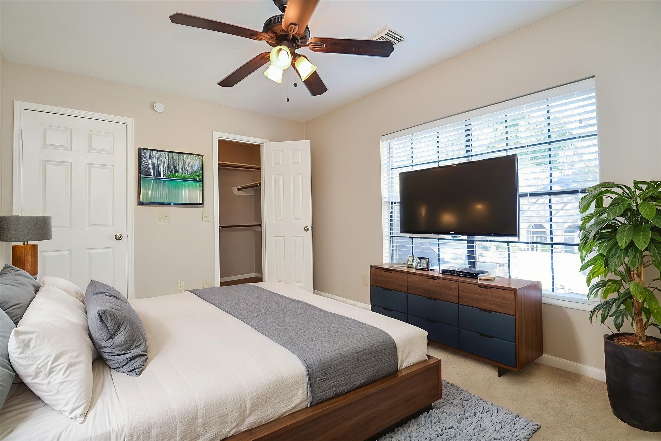 8803 Tweedbrook Drive Spring, TX 77379 - Photo 26 of 36 This spacious room has a well-appointed closet and plush carpeting for comfort underfoot.