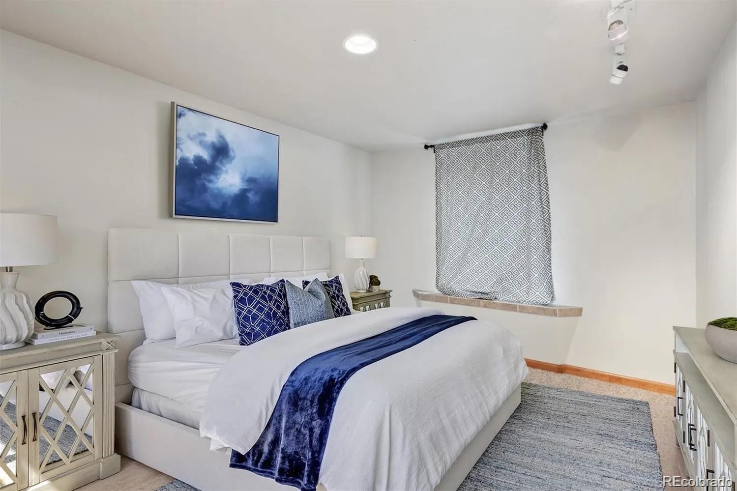 3201 Stuart Street Denver, CO 80212 - Photo 14 of 25 a bedroom with bed and window