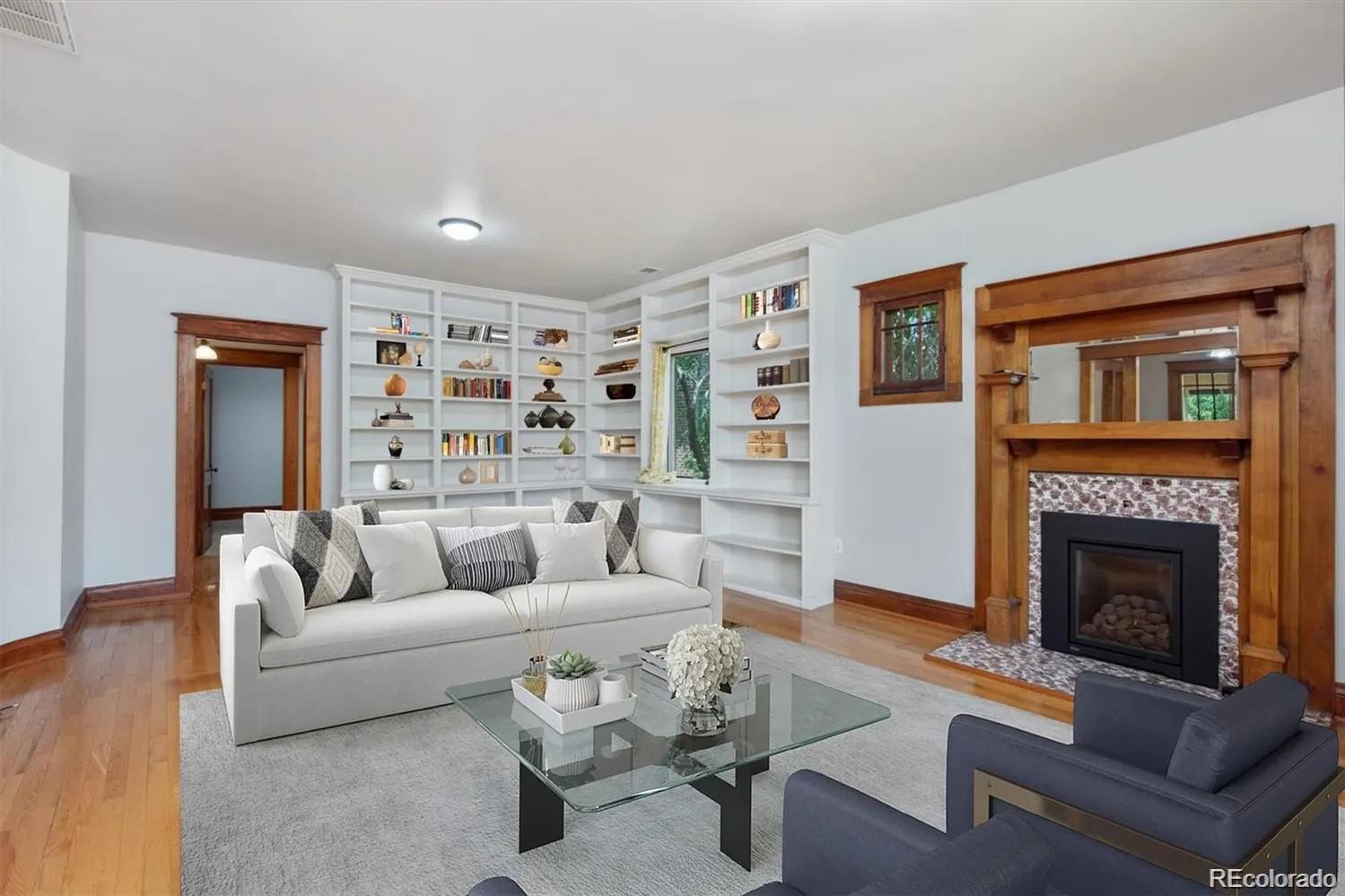 3201 Stuart Street Denver, CO 80212 - Photo 24 of 25 a living room with furniture and a fireplace