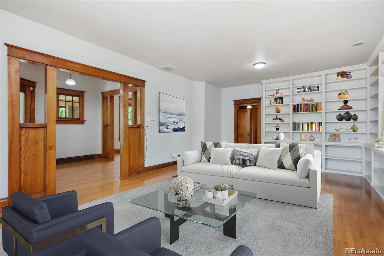 3201 Stuart Street Denver, CO 80212 - Photo 4 of 25 a living room with furniture and a wooden floor