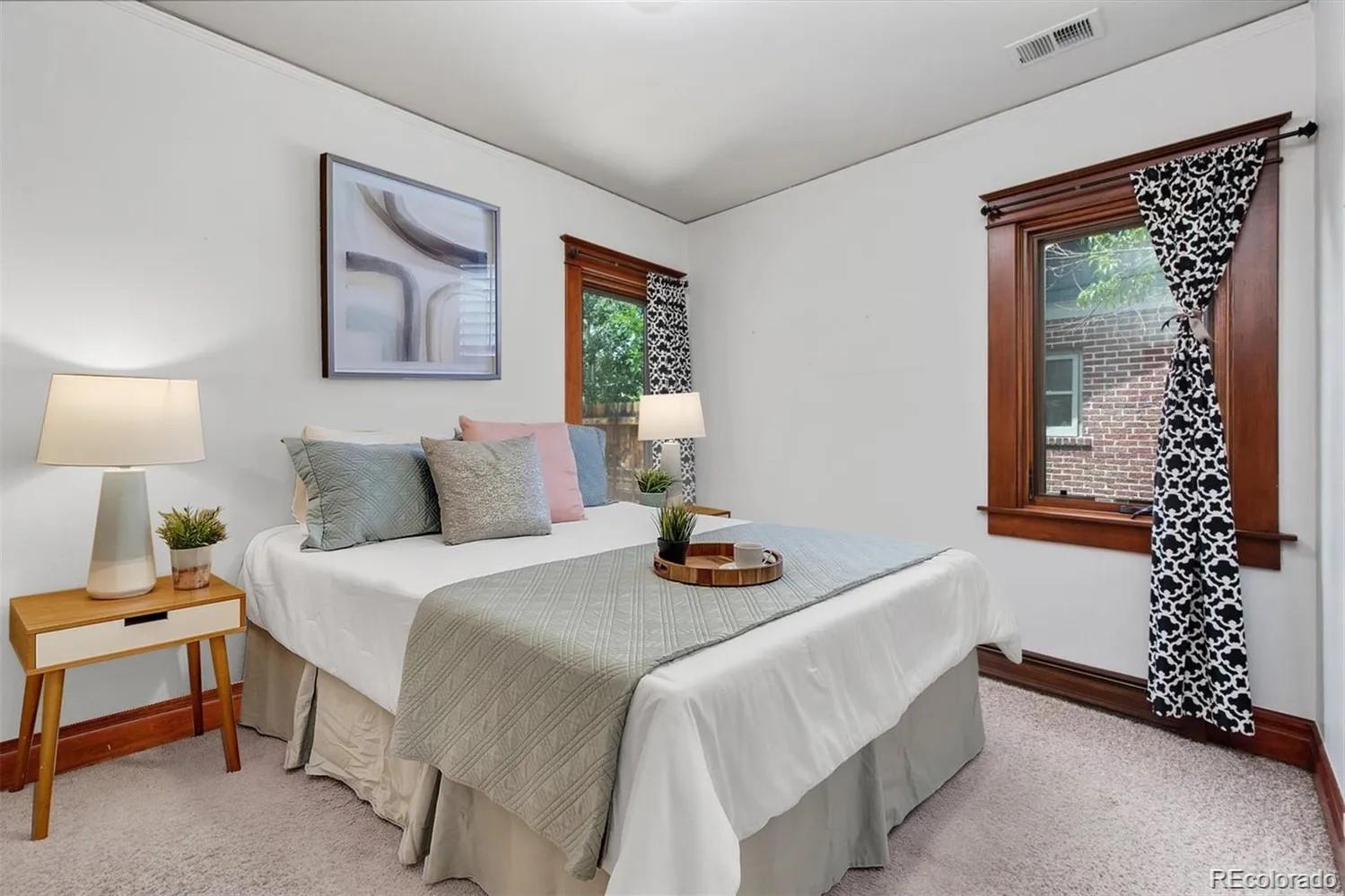 3201 Stuart Street Denver, CO 80212 - Photo 10 of 25 a bedroom with bed and a window