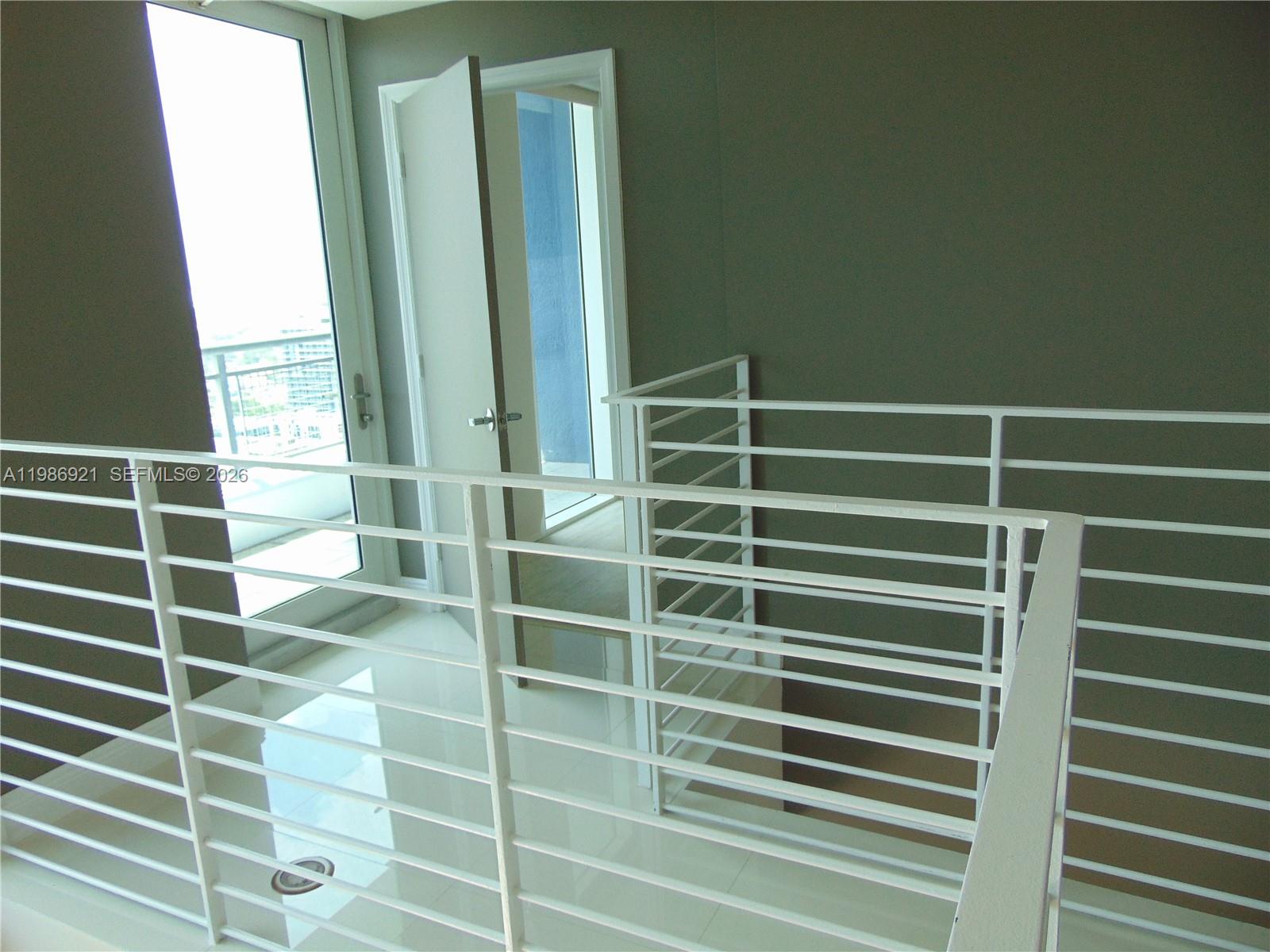 60 Southwest 13th Street, Unit 2619 Miami, FL 33130 - Photo 16 of 27 a view of a door with a glass door