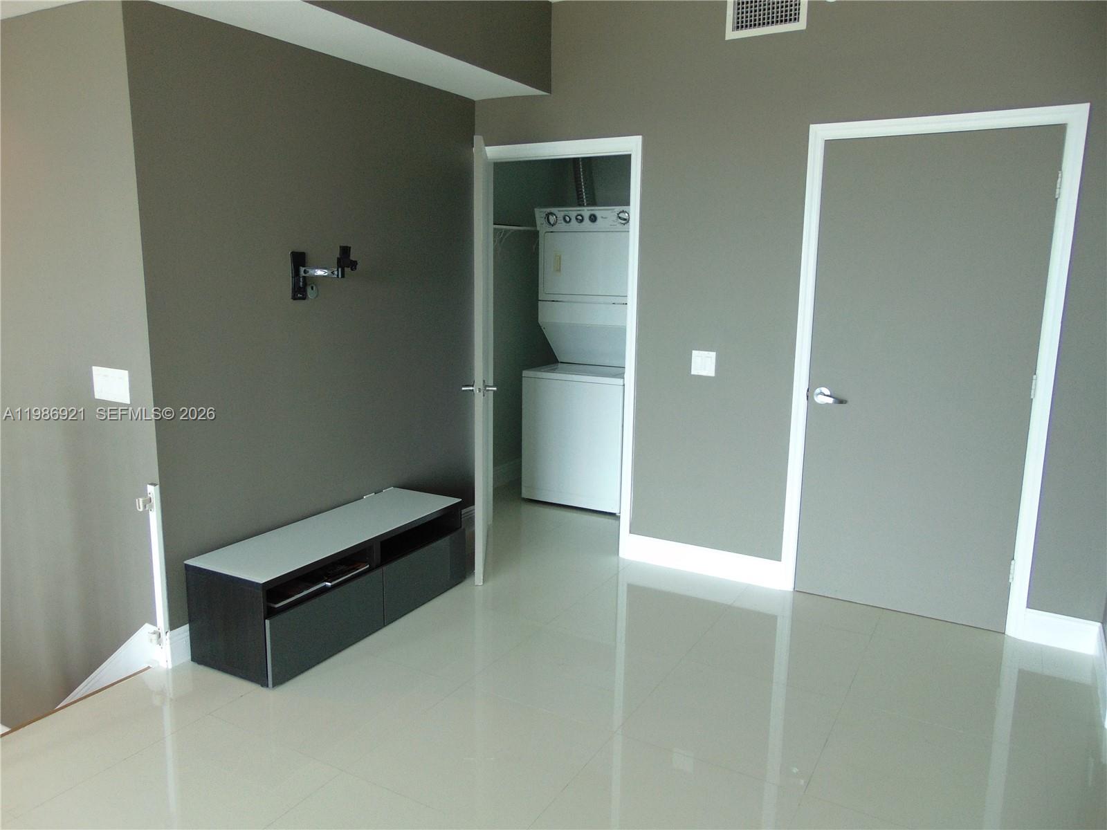 60 Southwest 13th Street, Unit 2619 Miami, FL 33130 - Photo 6 of 27 a view of a room with a bench