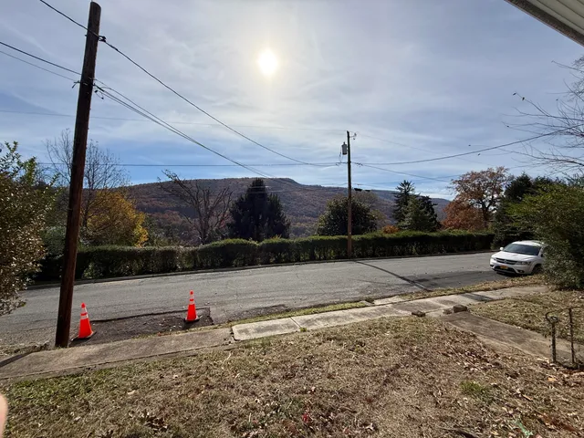a view of a road with sitting area