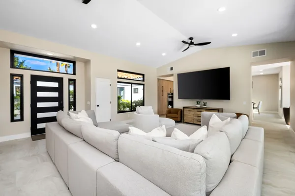 a view of a swimming pool with patio