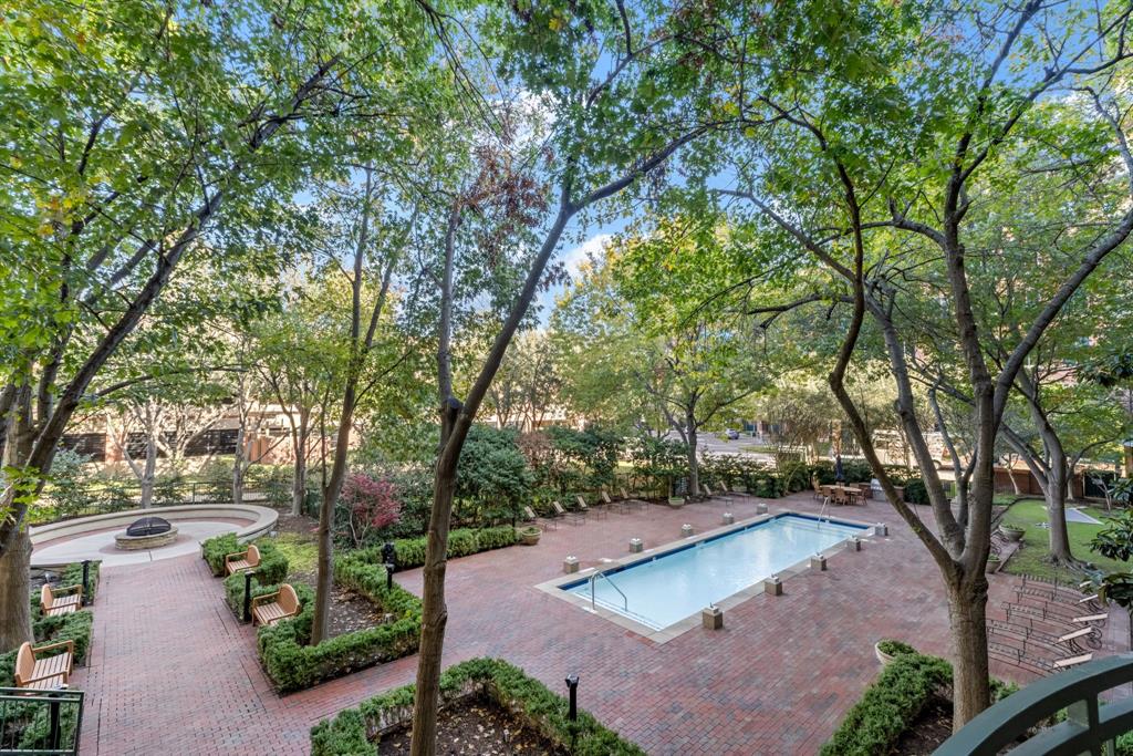 5055 Addison Circle, Unit 731 Addison, TX 75001 - Photo 35 of 40 The courtyard is well shaded and creates a nice sanctuary from the hustle and bustle of "The Circle".