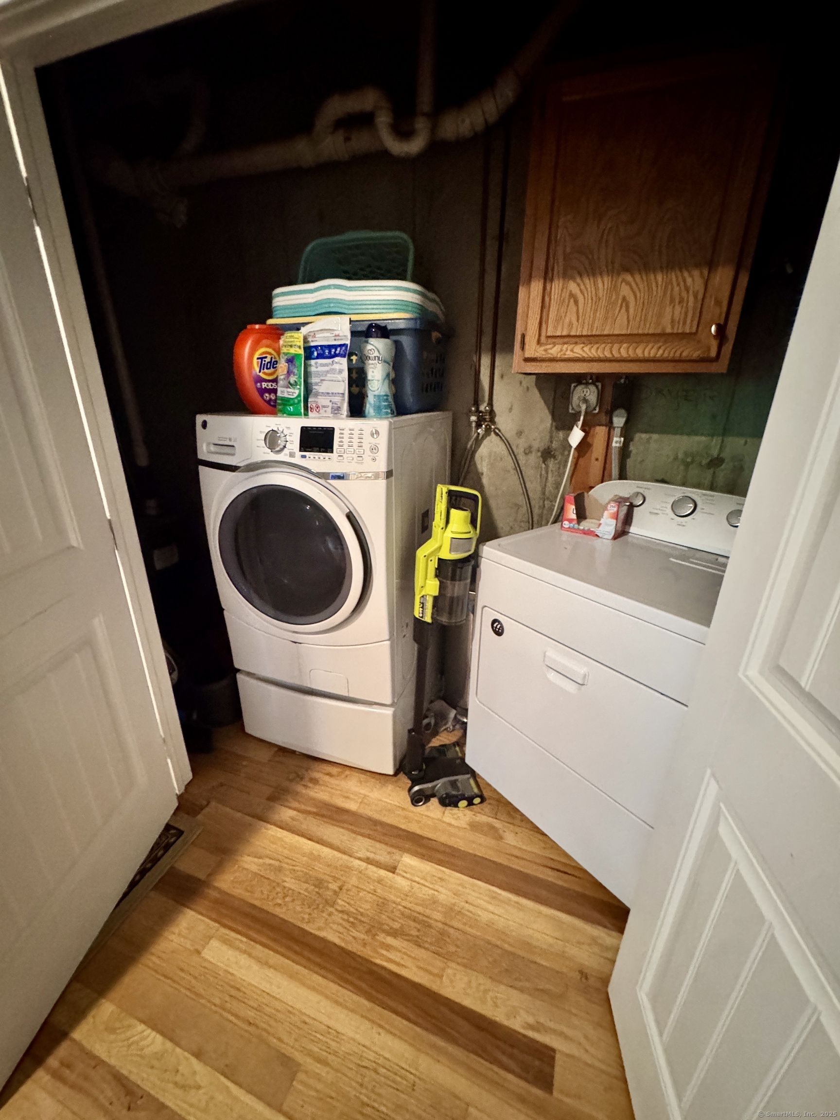 108 Webb Circle Monroe, CT 06468 - Photo 18 of 24 a utility room with dryer and washer
