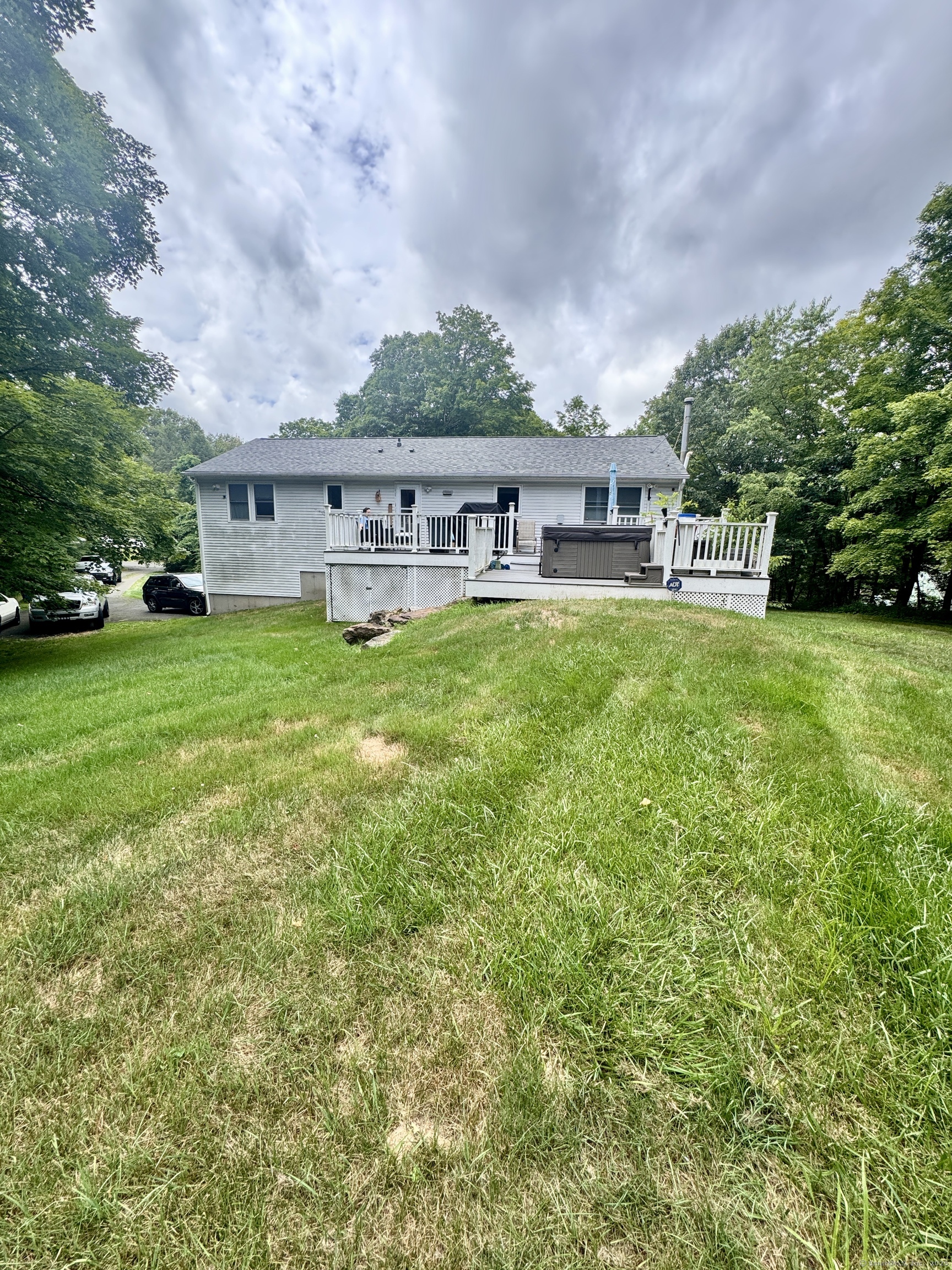 108 Webb Circle Monroe, CT 06468 - Photo 4 of 24 a backyard of a house with table and chairs