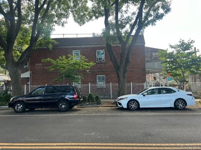 a car parked in front of a house